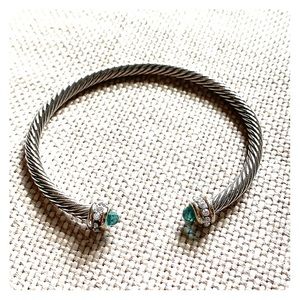Rope bracelet with green stone